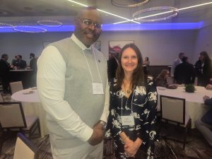 Chuck Grigsby poses for a photo with State Representative Penelope Tsernoglou.